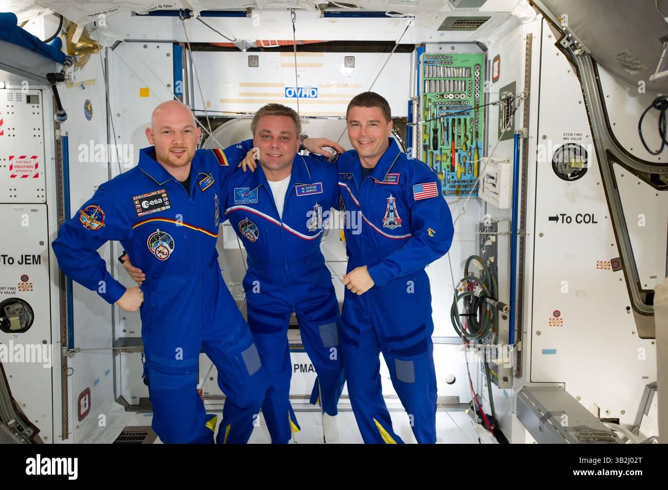 Aug. 23, 2014 - International Space Station, EARTH ORBIT - European Space Agency astronaut Alexander Gerst (left), Russian cosmonaut Maxim Suraev (center) and NASA astronaut Reid Wiseman, all Expedition 40 flight engineers, pose for a portrait in the Harmony node of the International Space Station August 23, 2014 in Earth Orbit. (Credit Image: © Nasa/Planet Pix via ZUMA Wire) Stock Photo