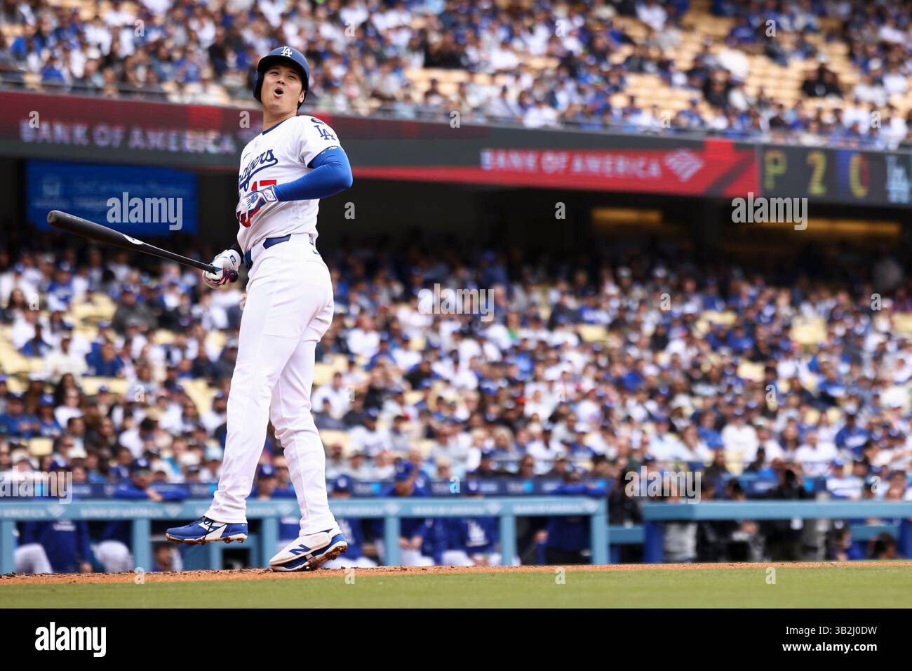 Los Angeles Dodgers designated hitter Shohei Ohtani reacts after a ...