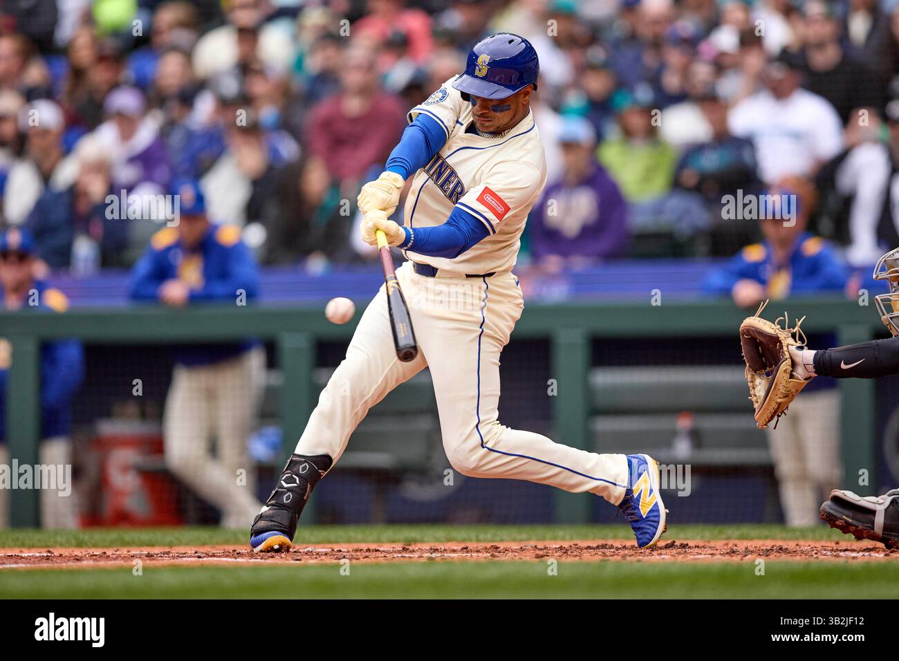 Seattle Mariners' Jorge Polanco hits an RBI double against the Miami