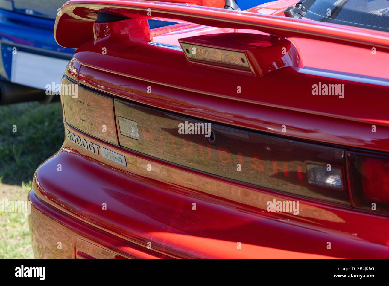 Close up of the rear end of a red mitsubishi 3000gt vr 4, highlighting ...