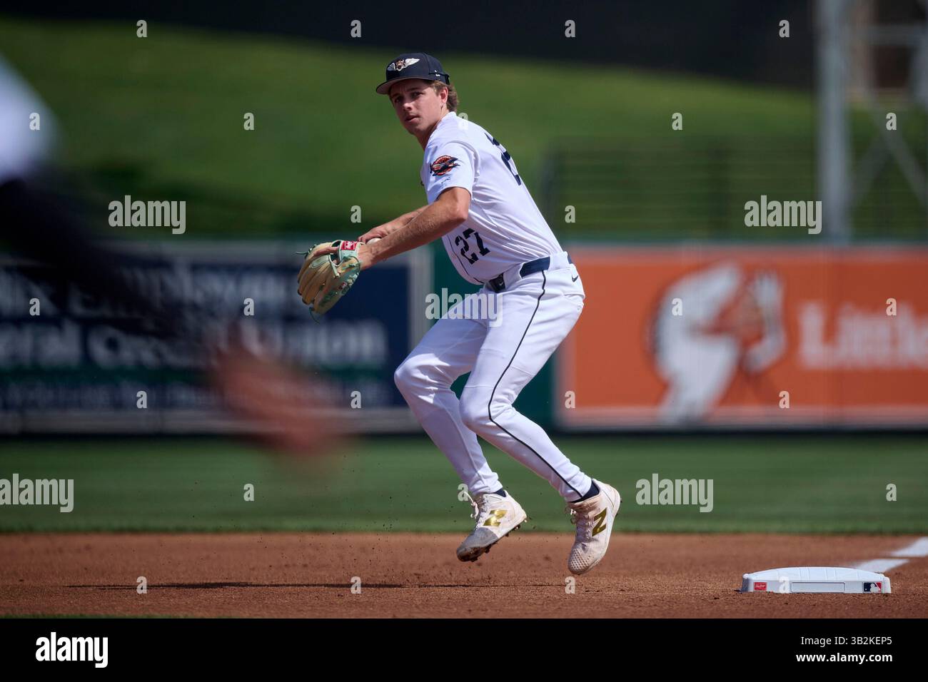 Lakeland Flying Tigers shortstop Bryce Rainer (27) throws to first base ...