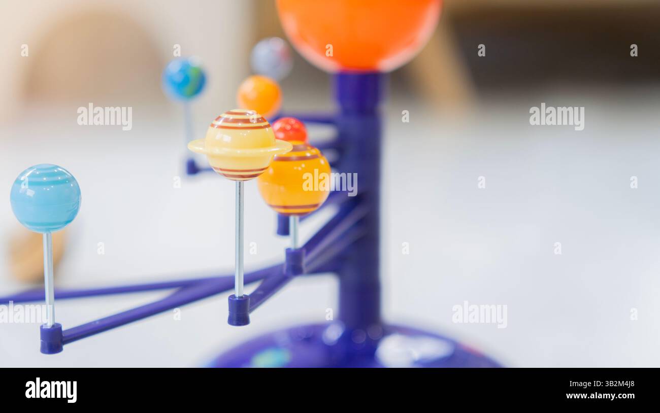 Solar system model. Kids planetarium. Little planets for kids. Astronomy fun. Science class in school. Creative educational game. Arts and crafts for Stock Photo