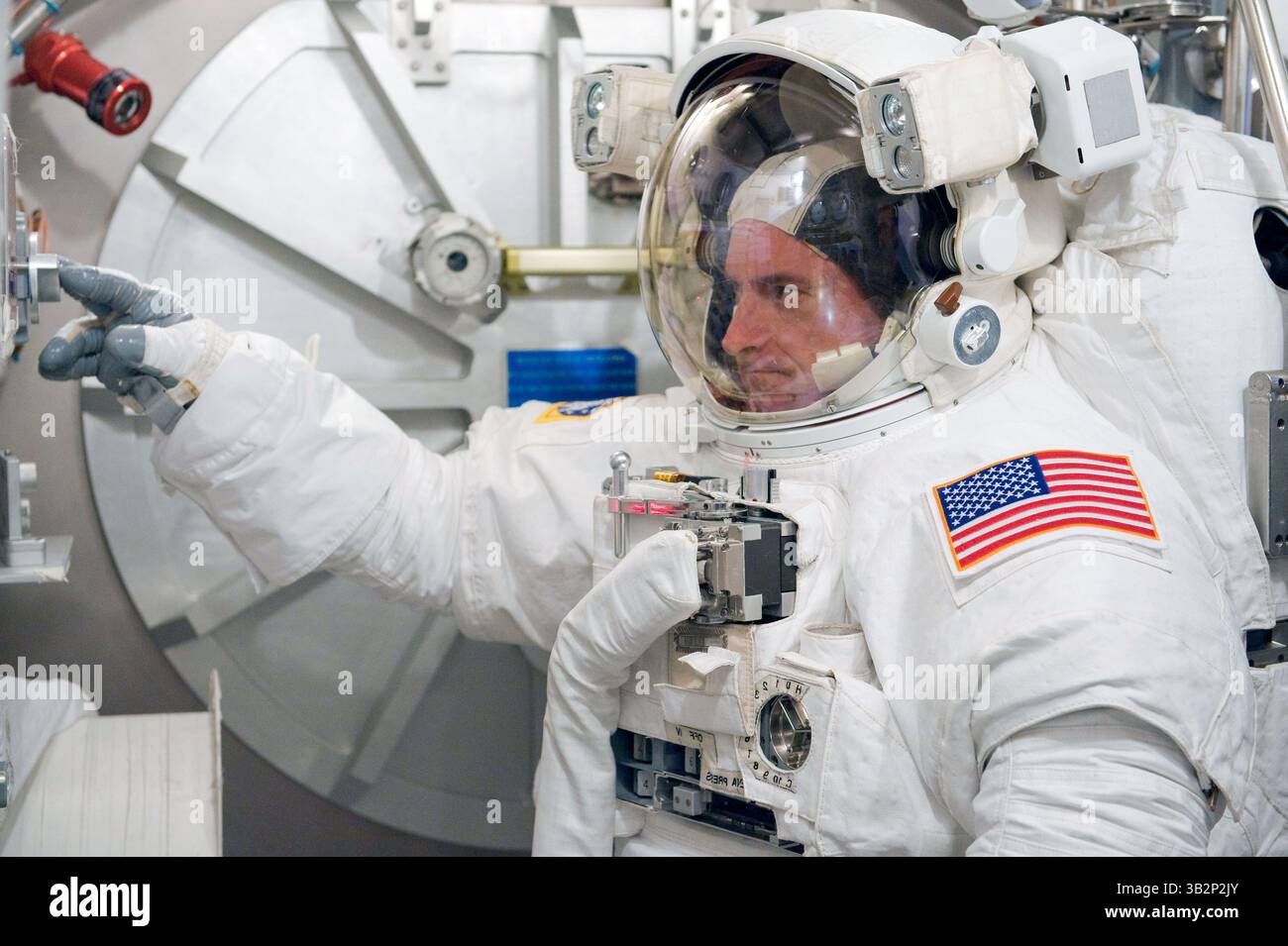 April 14, 2010 - Houston, TX, United States of America - NASA astronaut Scott Kelly participates in an Extravehicular Mobility Unit spacesuit fit check in the Space Station Airlock Test Article in the Crew Systems Laboratory at the Johnson Space Center April 14, 2010 in Houston, Texas. (Credit Image: © Mark Sowa/Planet Pix via ZUMA Wire) Stock Photo