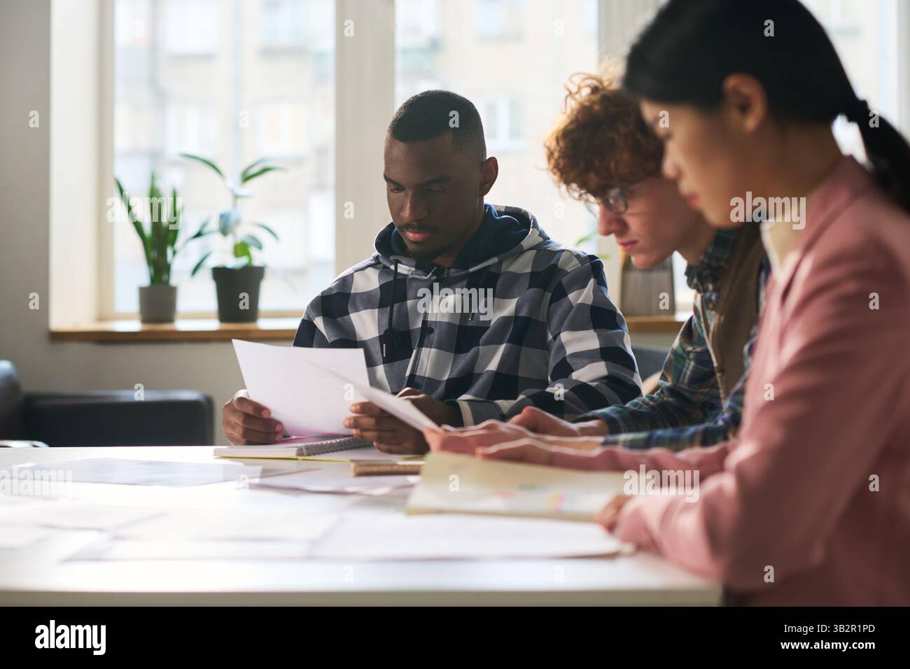 Students Studying Languages in Classroom Environment Stock Photo