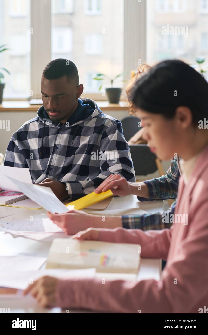 Students Studying Foreign Languages in Classroom Environment Stock Photo