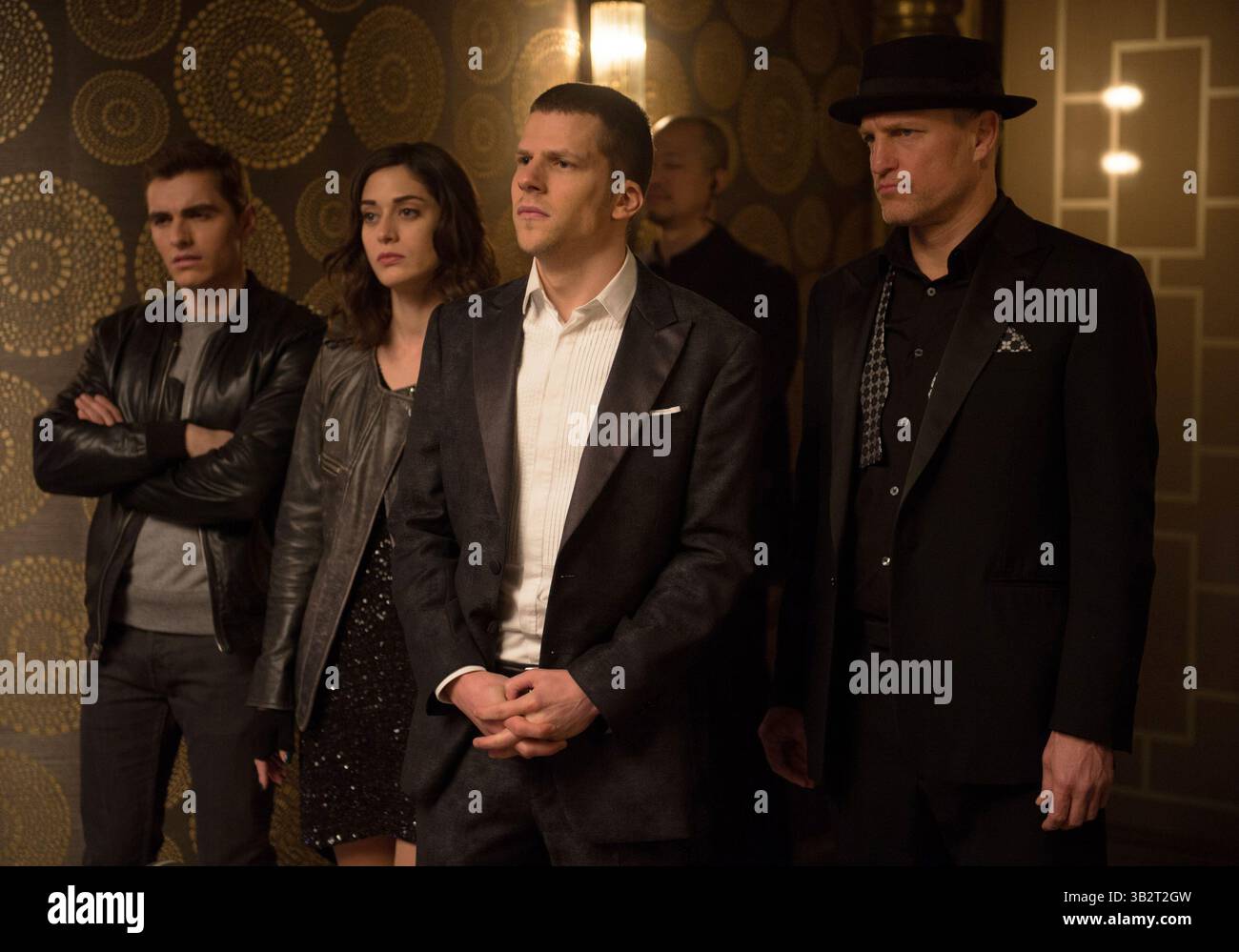 RELEASE DATE: June 10 2016.TITLE: Now You See Me 2.STUDIO: Lionsgate.DIRECTOR: Jon M. Chu.PLOT: One year after outwitting the FBI and winning the public's adulation with their Robin Hood-style magic spectacles, The Four Horsemen resurface for a comeback performance in hopes of exposing the unethical practices of a tech magnate.PICTURED: LIZZY CAPLAN as Lula, JESSE EISENBERG as J. Daniel Atlas, WOODY HARRELSON as Merritt McKinney.(Credit: © Lionsgate/Entertainment Pictures) Stock Photo