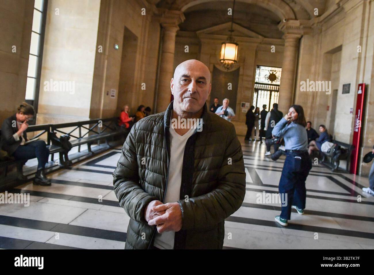 Yunis Abbas arrives at the Paris Courthouse for the Rue Tronchet Kim