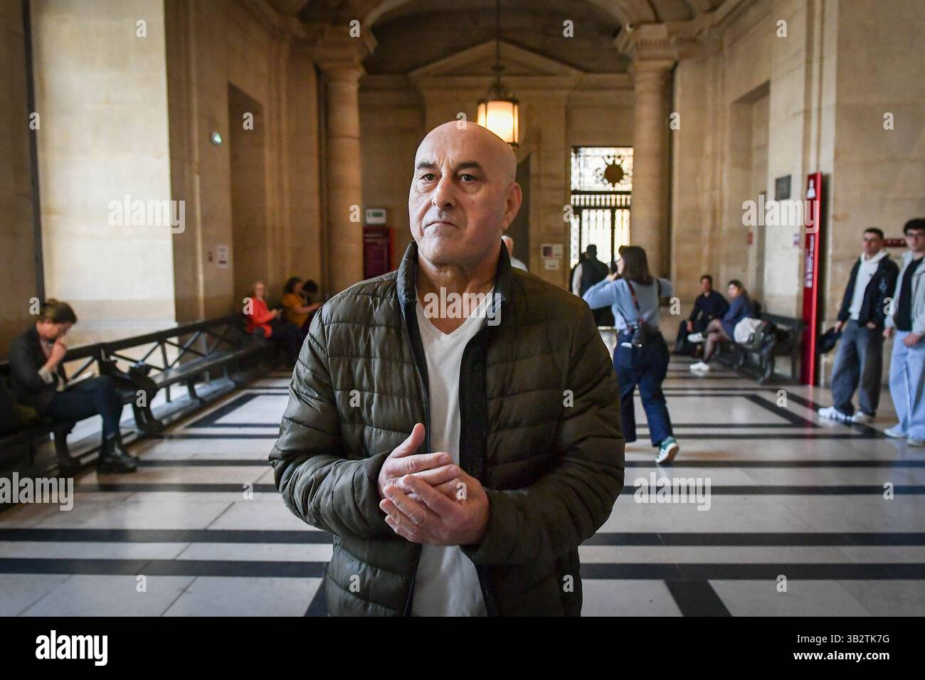 Yunis Abbas arrives at the Paris Courthouse for the Rue Tronchet Kim