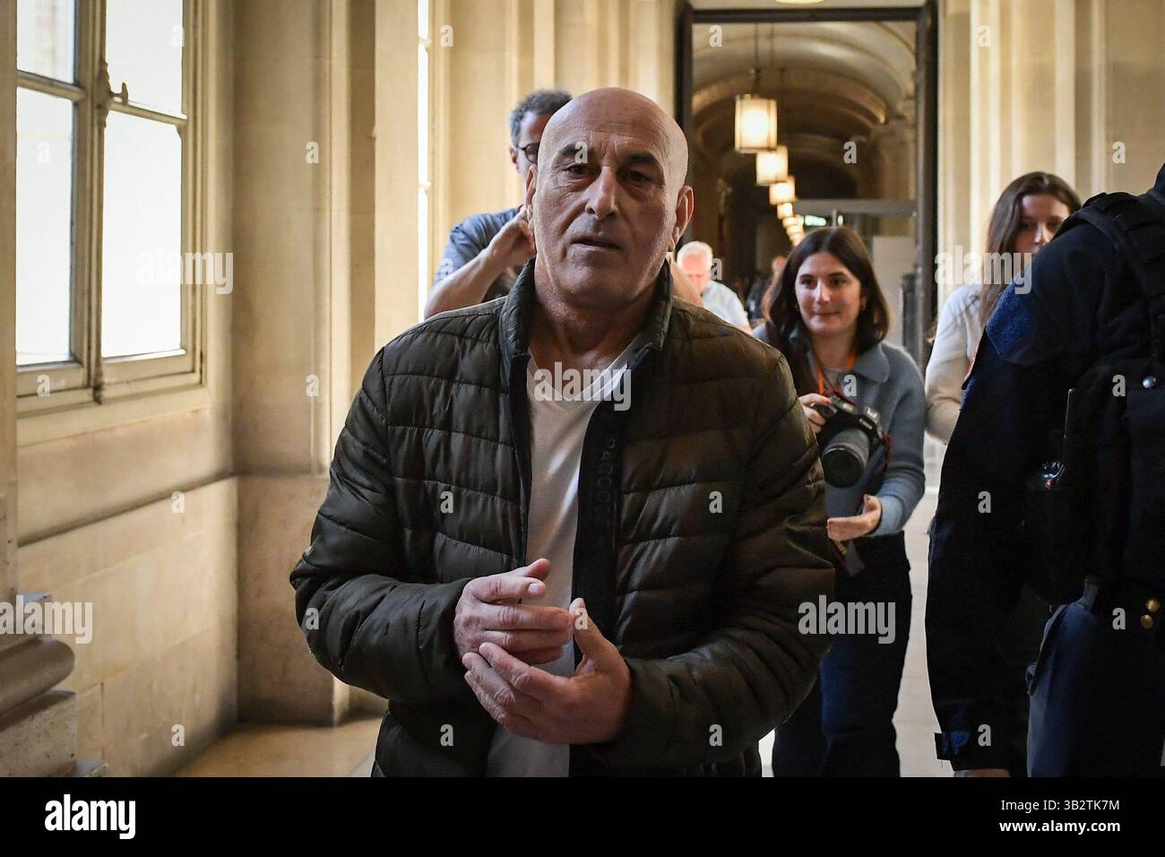 Yunis Abbas arrives at the Paris Courthouse for the Rue Tronchet Kim
