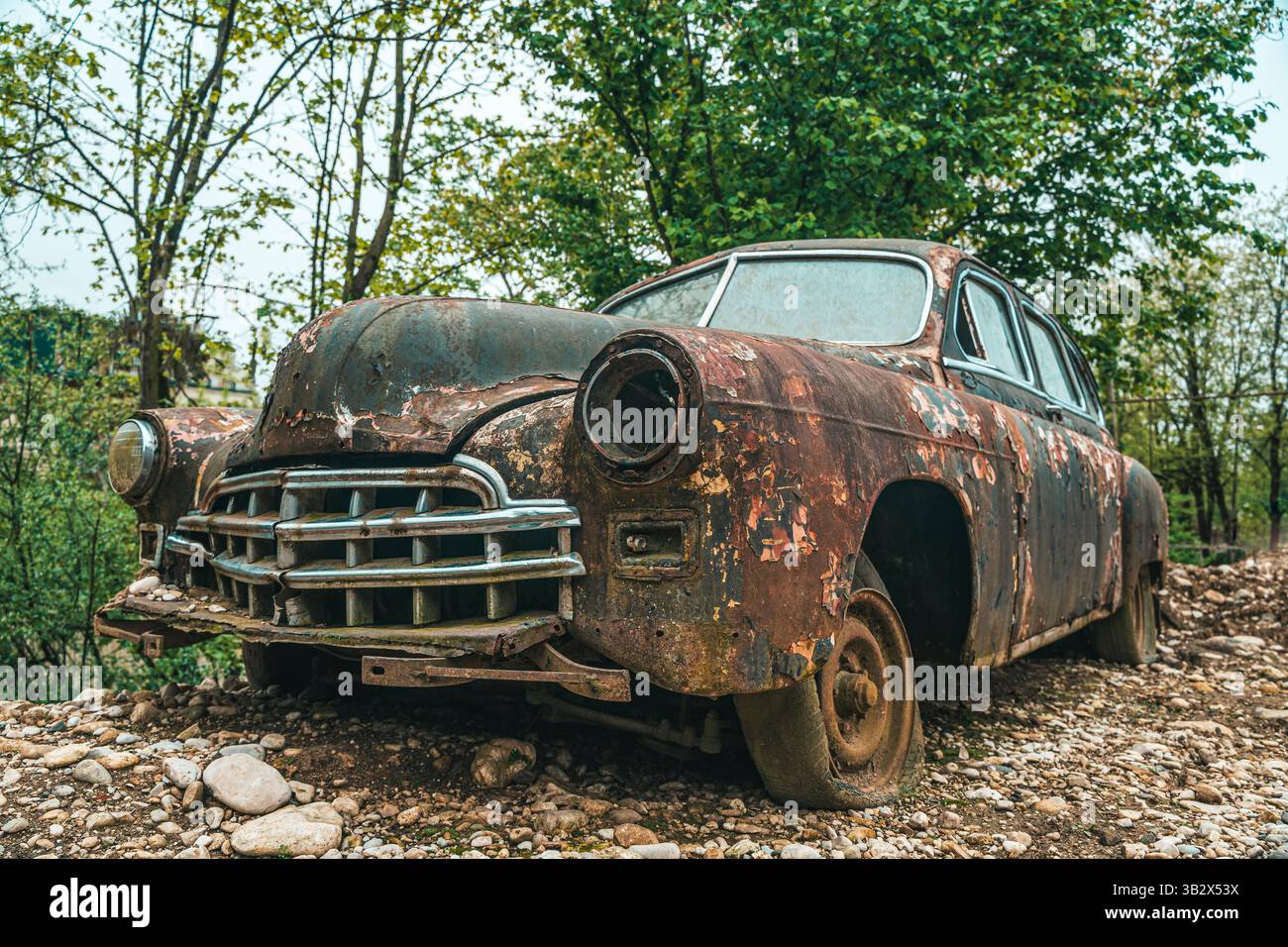 Old rusty car. Abandoned retro vintage car from the 60s. High quality ...