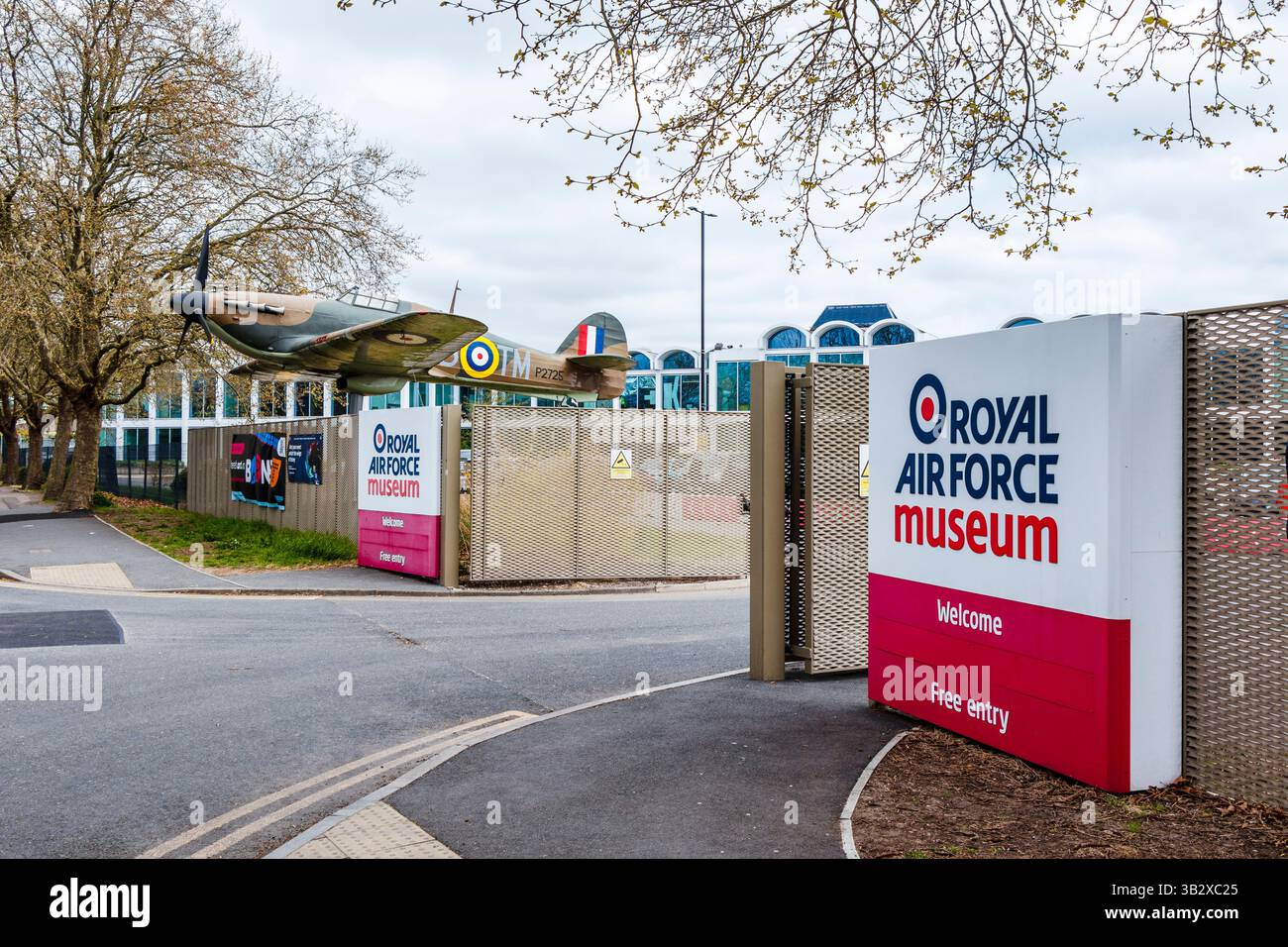 A World War Two Hawker Hurricane fighter plane at the entrance to the RAF Museum in Hendon, North London, UK Stock Photo