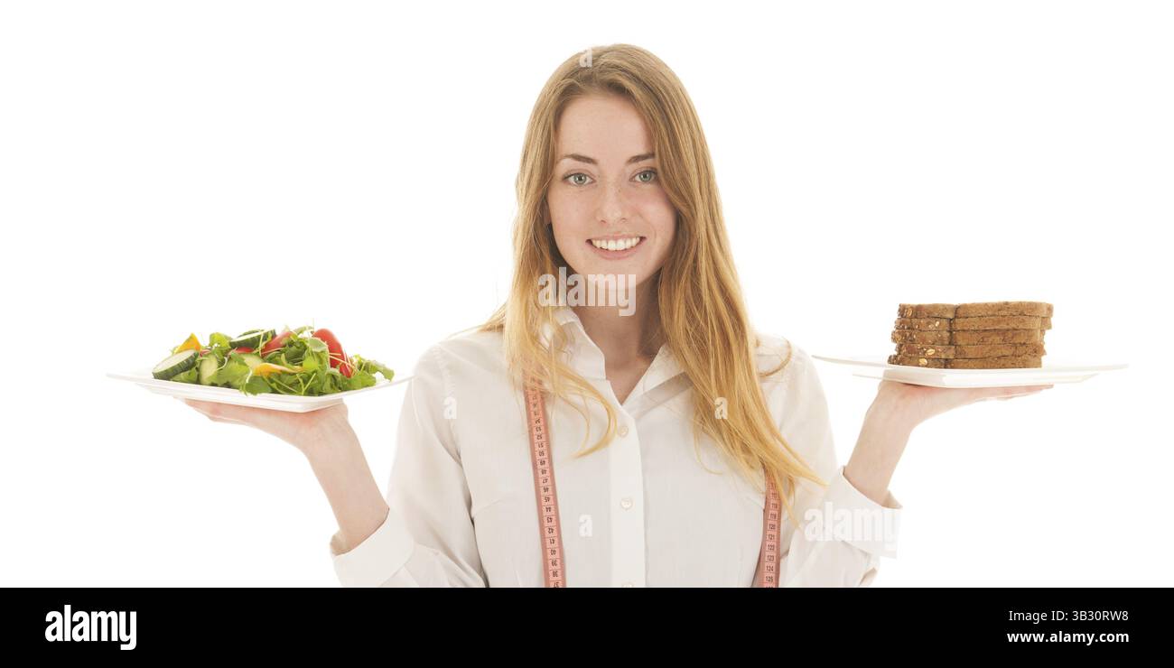 Woman with diet of fresh vegetables salad and bread Stock Photo