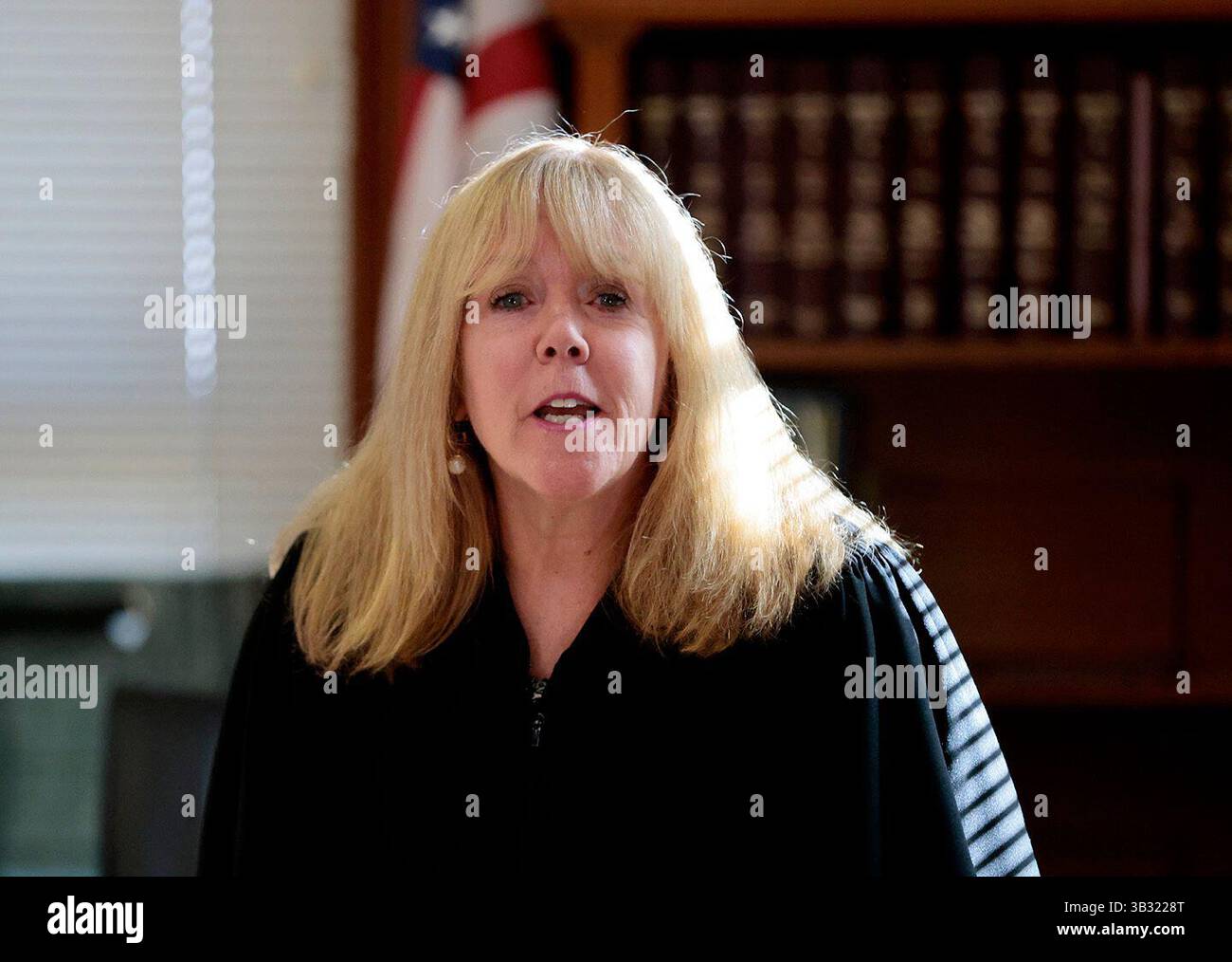 Judge Beverly J. Cannone greets jurors as the murder retrial of Karen ...