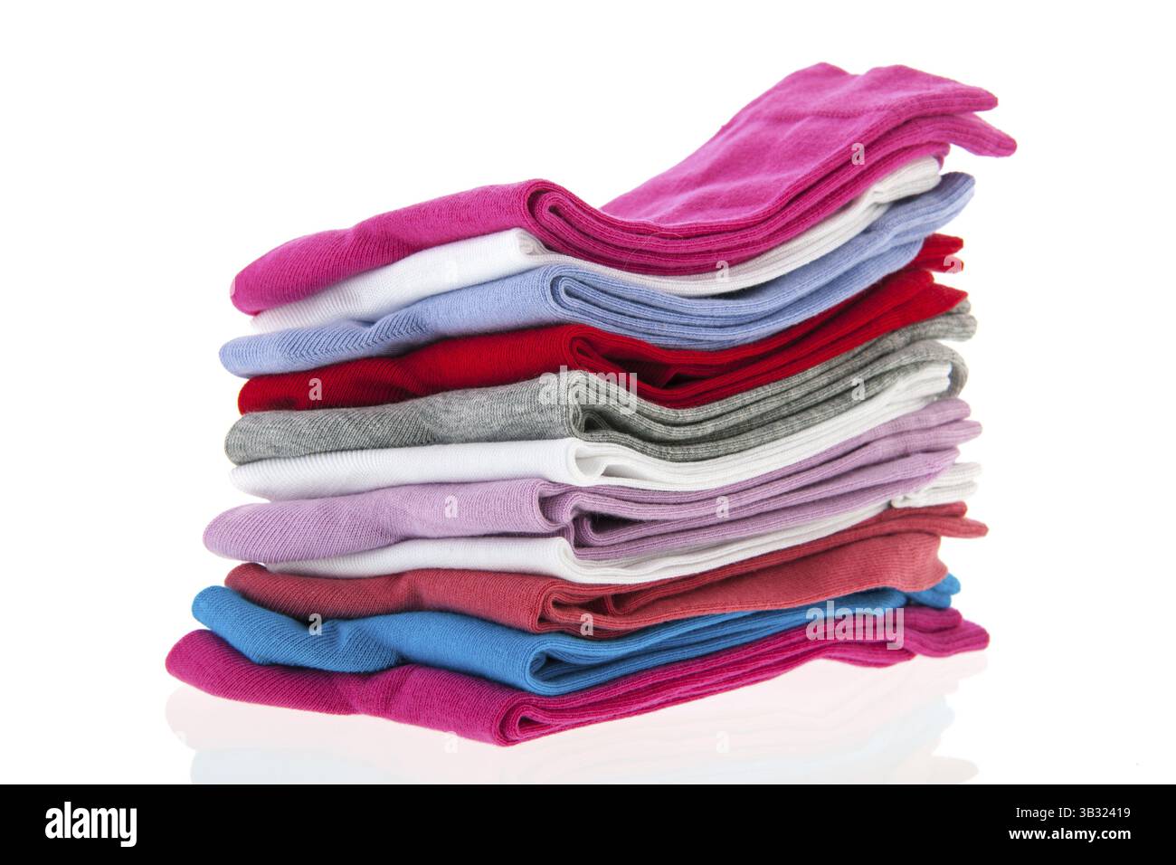 Stacked colorful socks isolated over white background Stock Photo
