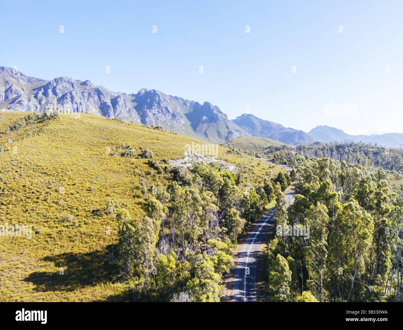 An aerial view of Gordon River Rd at the Sentinel range of mountains ...
