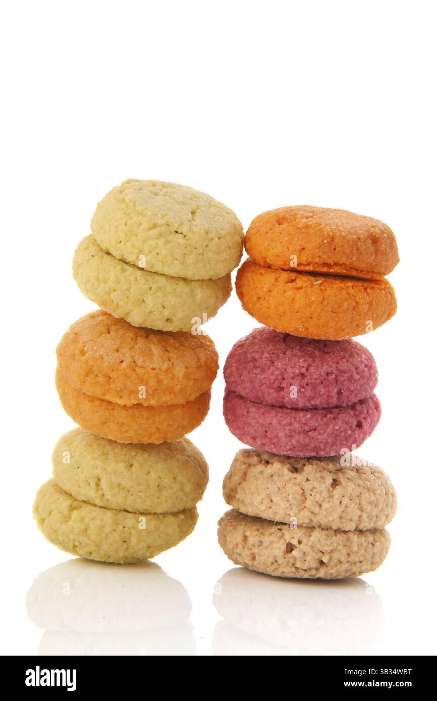 Stacked colorful macaroons isolated over white background Stock Photo