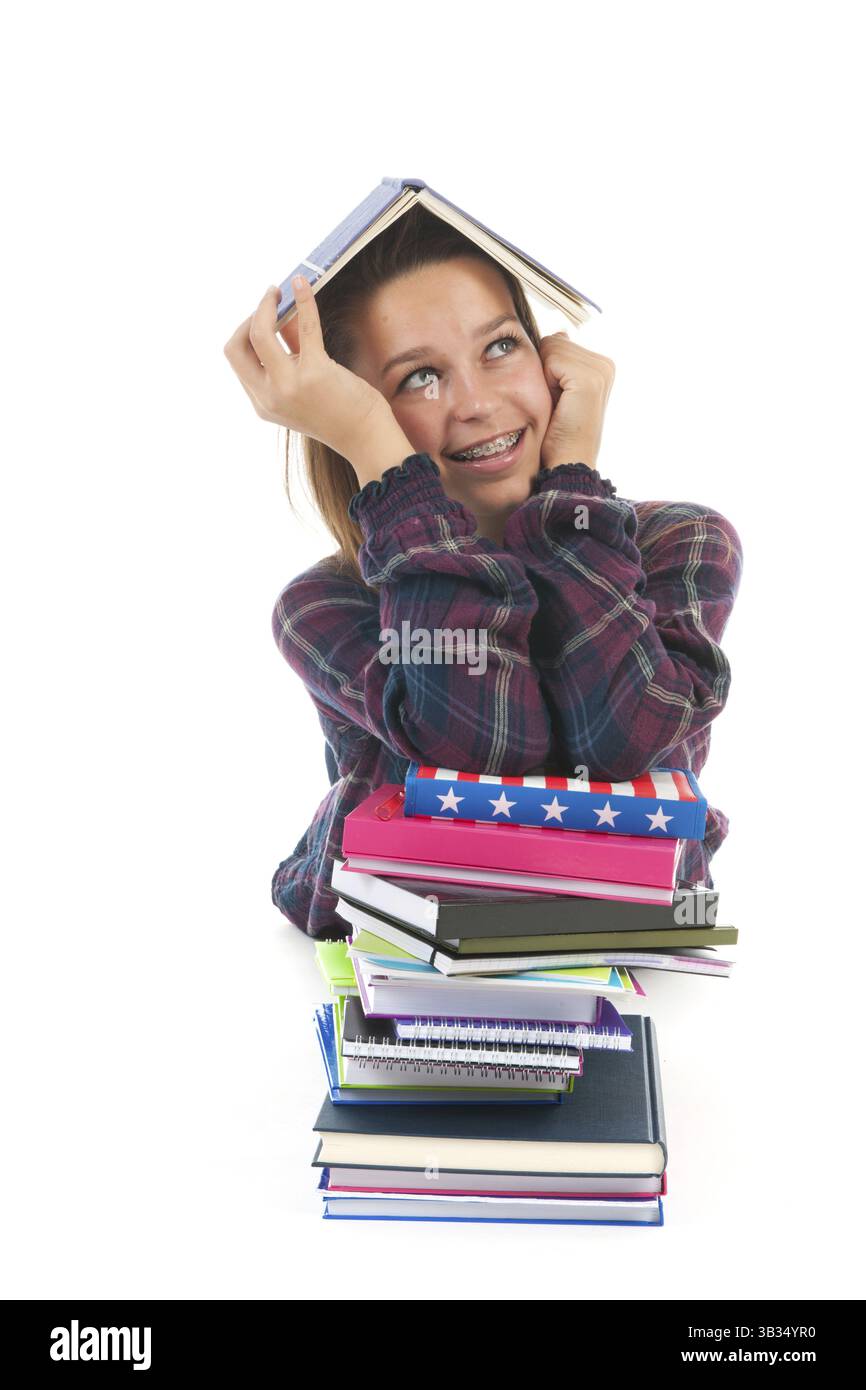 School girl with books isolated over white background Stock Photo - Alamy