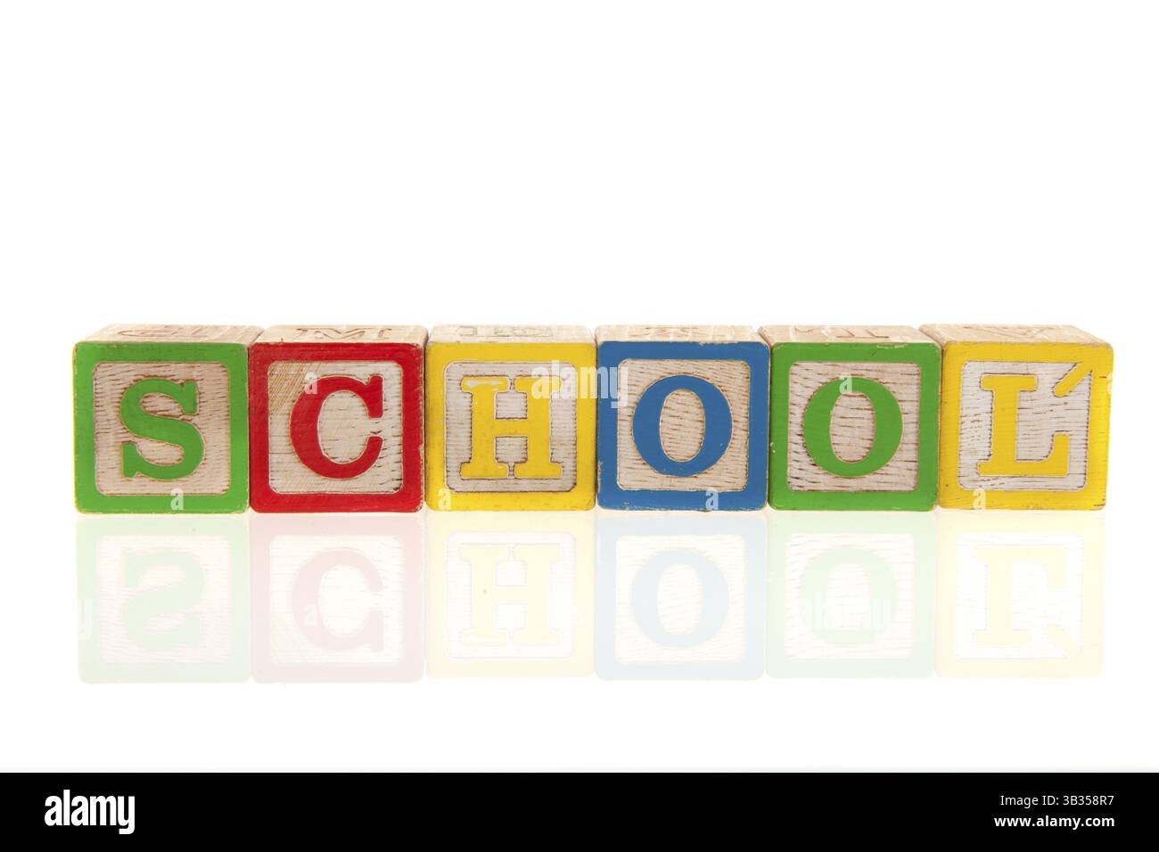 Colorful educational wooden toy blocks with letters Stock Photo