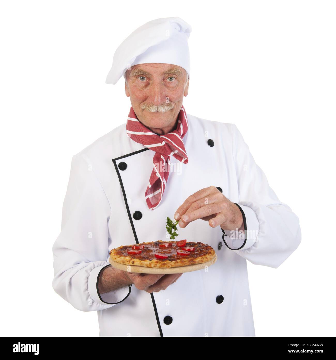Italian cook holding pizza for finishing touch Stock Photo - Alamy