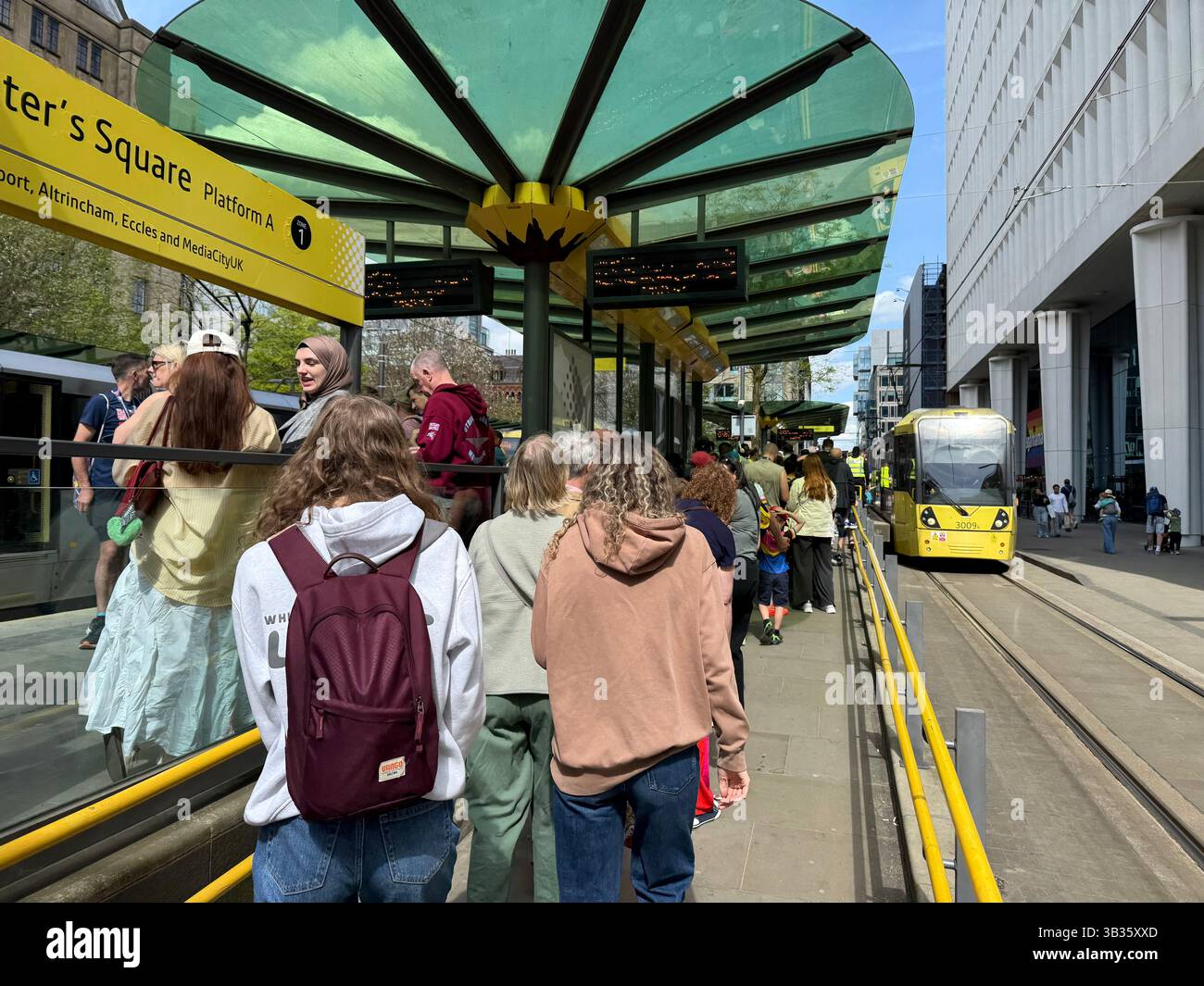 Saint Peter’s Square Metro Station with packed platform and tram just arriving - Smartphone Captured Stock Image Saint Peter’s Square Metro Station with packed platform and tram just arriving - Smartphone Captured Stock Image