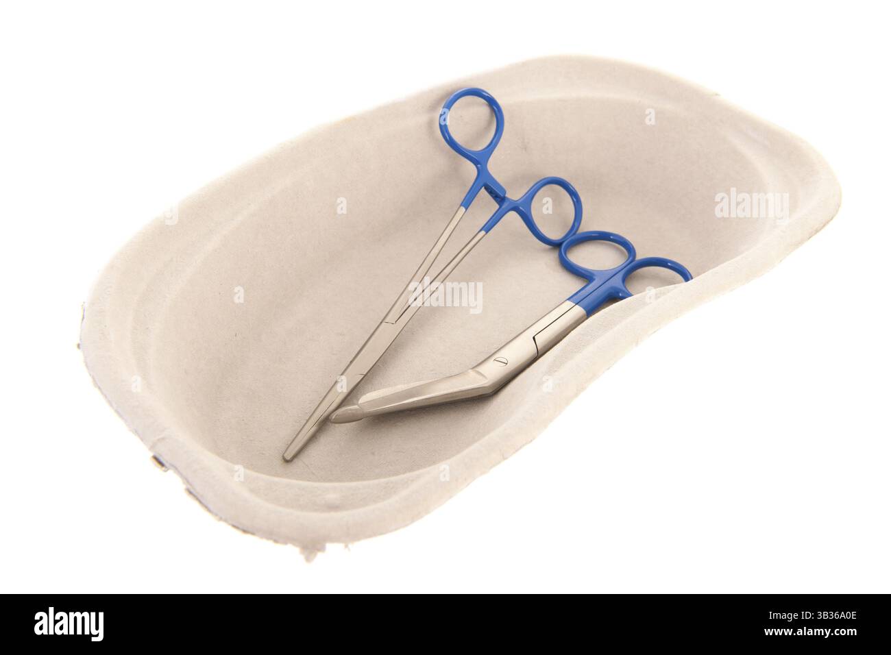 Medical scissors in renal pelvis carton box isolated over white ...