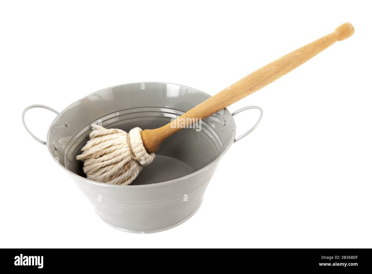 Basin for washing the dishes with brush and clothes Stock Photo