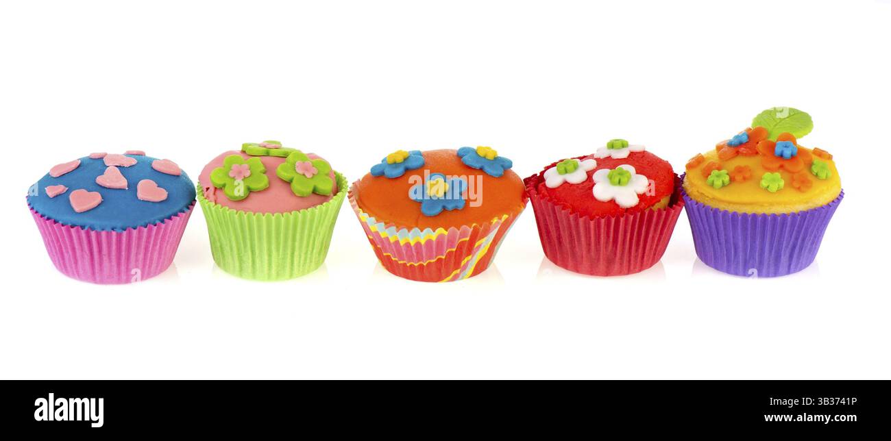 Row with five colorful different cupcakes Stock Photo