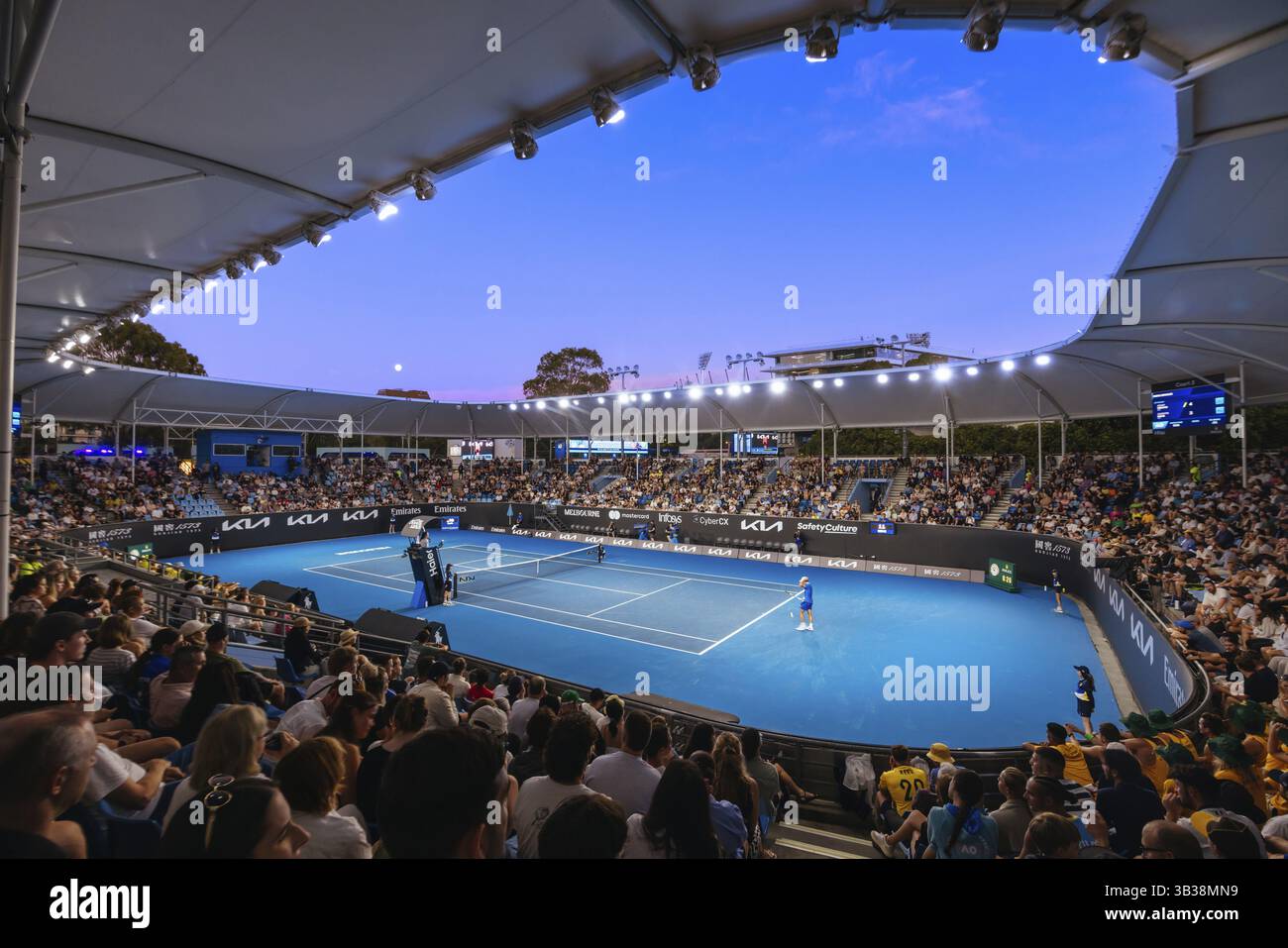 MELBOURNE, AUSTRALIA - JANUARY 12: Court 3 atmosphere at dusk as Adam Walton of Australia plays Quentin Halyson of France on day 1 of the 2025 Austral Stock Photo