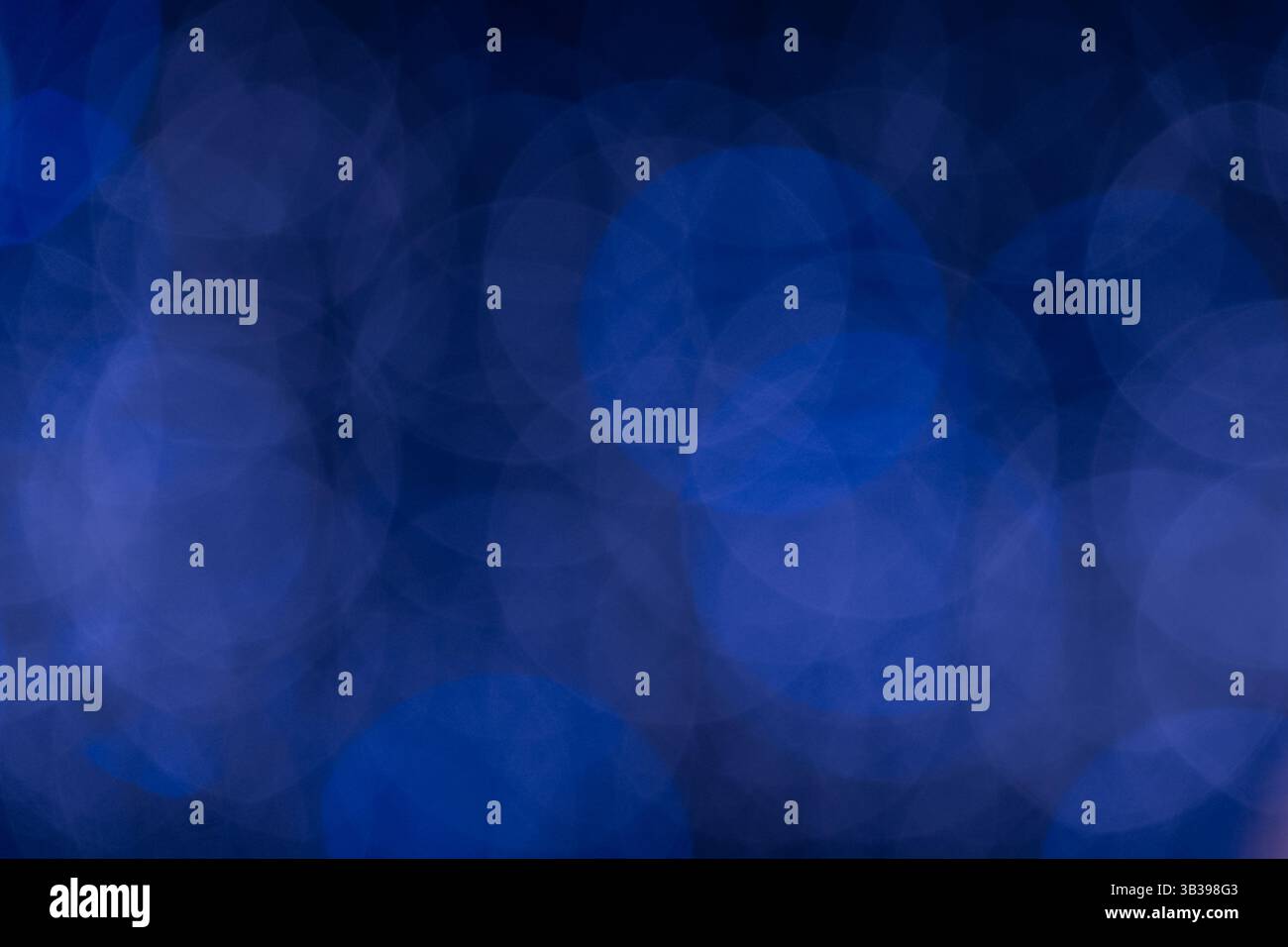 Abstract blue bokeh light pattern for background design or creative visual projects Stock Photo