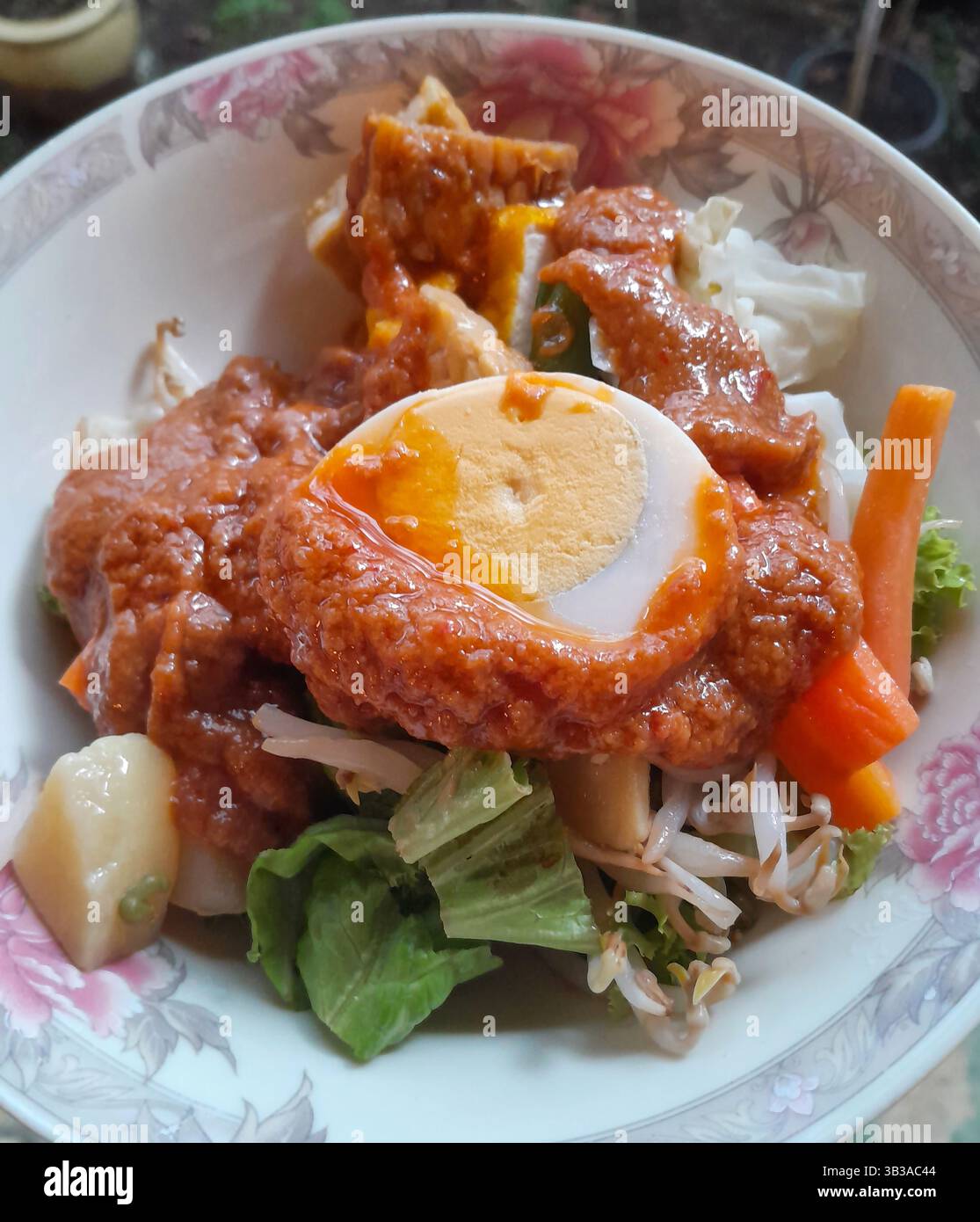 Gado Gado, an Indonesian traditional salad with assorted vegetables ...