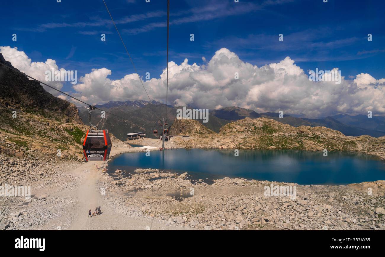 Passo Tonale, Italy - 10.08.2024: Scenic mountain cable car ride over ...