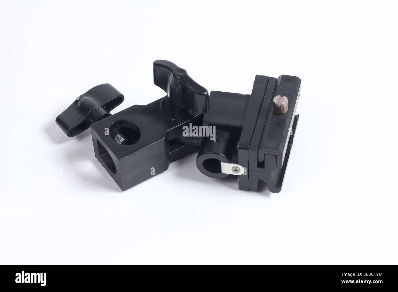 flash holder tripod mount for external flash and white umbrella for studio shooting Stock Photo