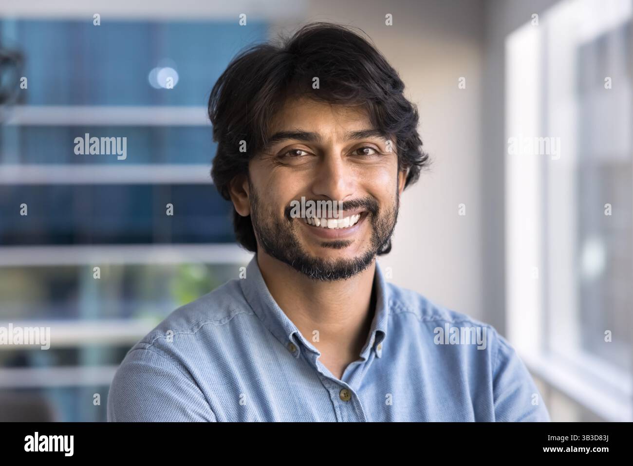 Head shot portrait of happy Indian businessman Stock Photo
