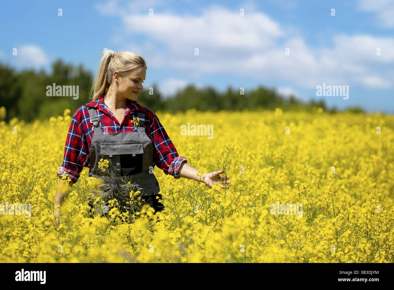Girl in overalls hi-res stock photography and images - Alamy