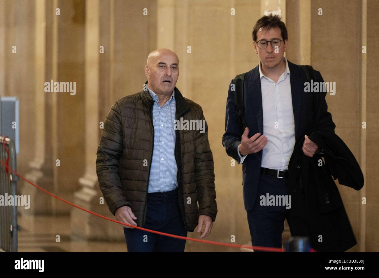 Accused robber Yunice Abbas and his lawyer Gabriel Dumenil arrive for ...