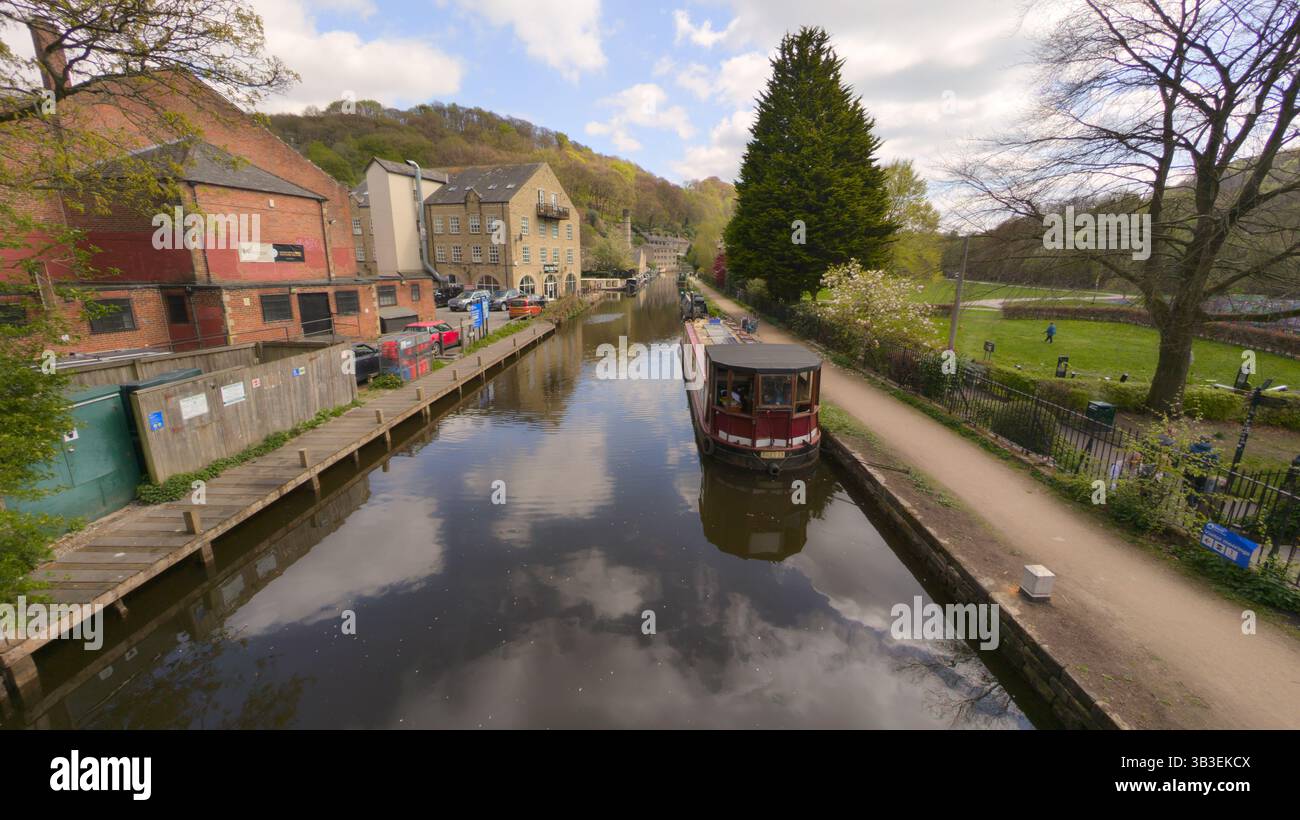 Canal with narrowboats in Spring sunshine. Hebden Bridge, West Yorkshire UK. - Smartphone Captured Stock Image