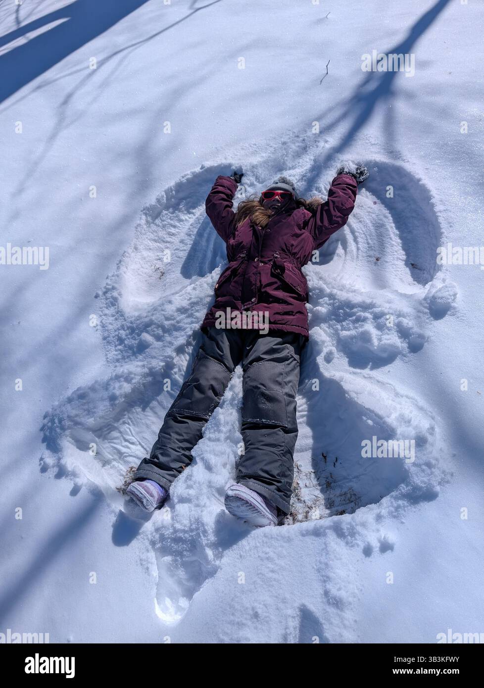 Kids playing in the snow - Smartphone Captured Stock Image