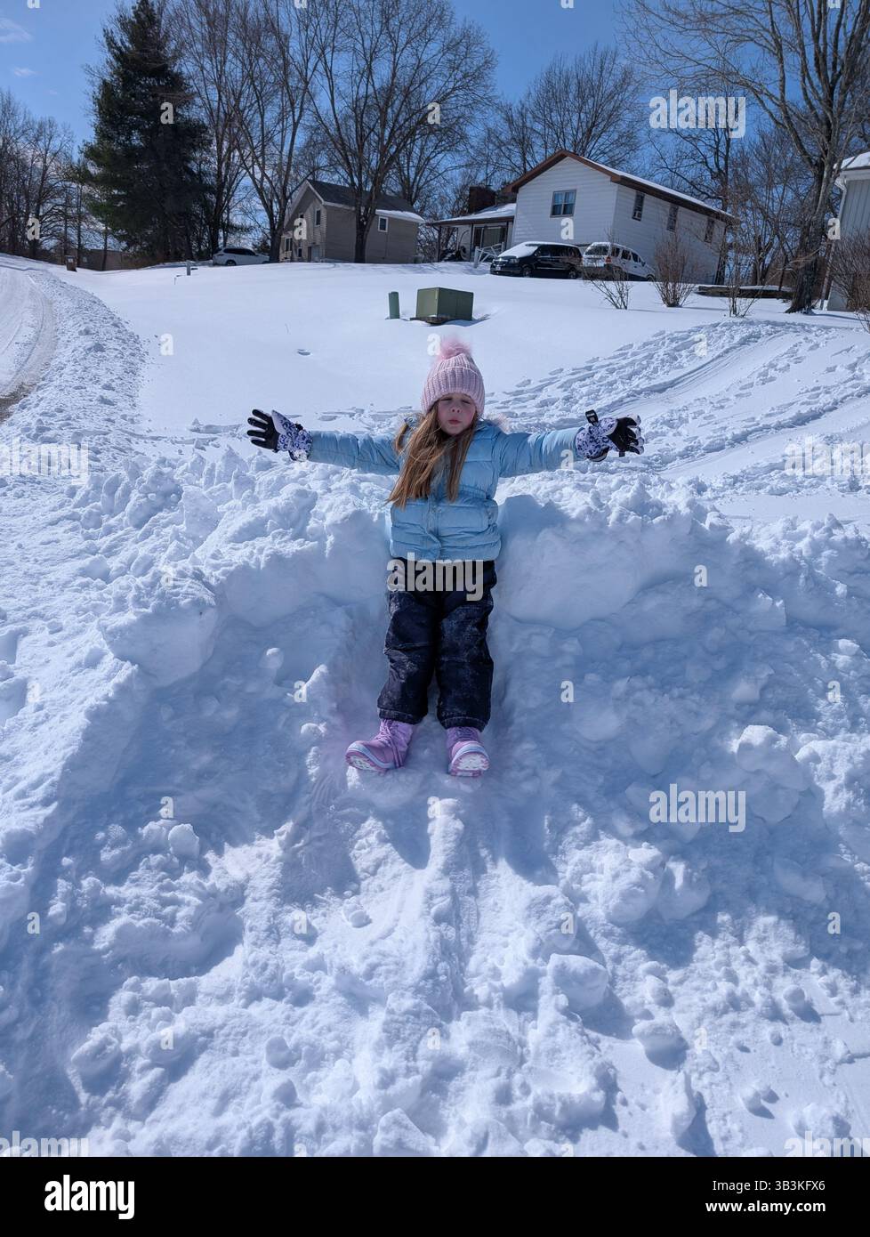 Kids playing in the snow - Smartphone Captured Stock Image