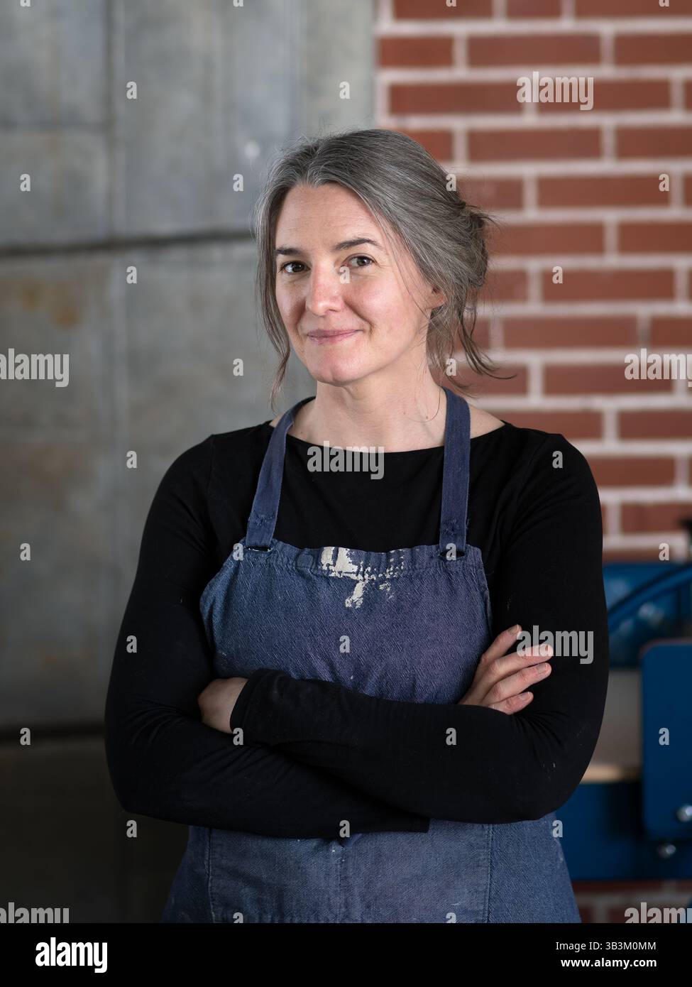 Ceramic artists working in pottery studio Stock Photo