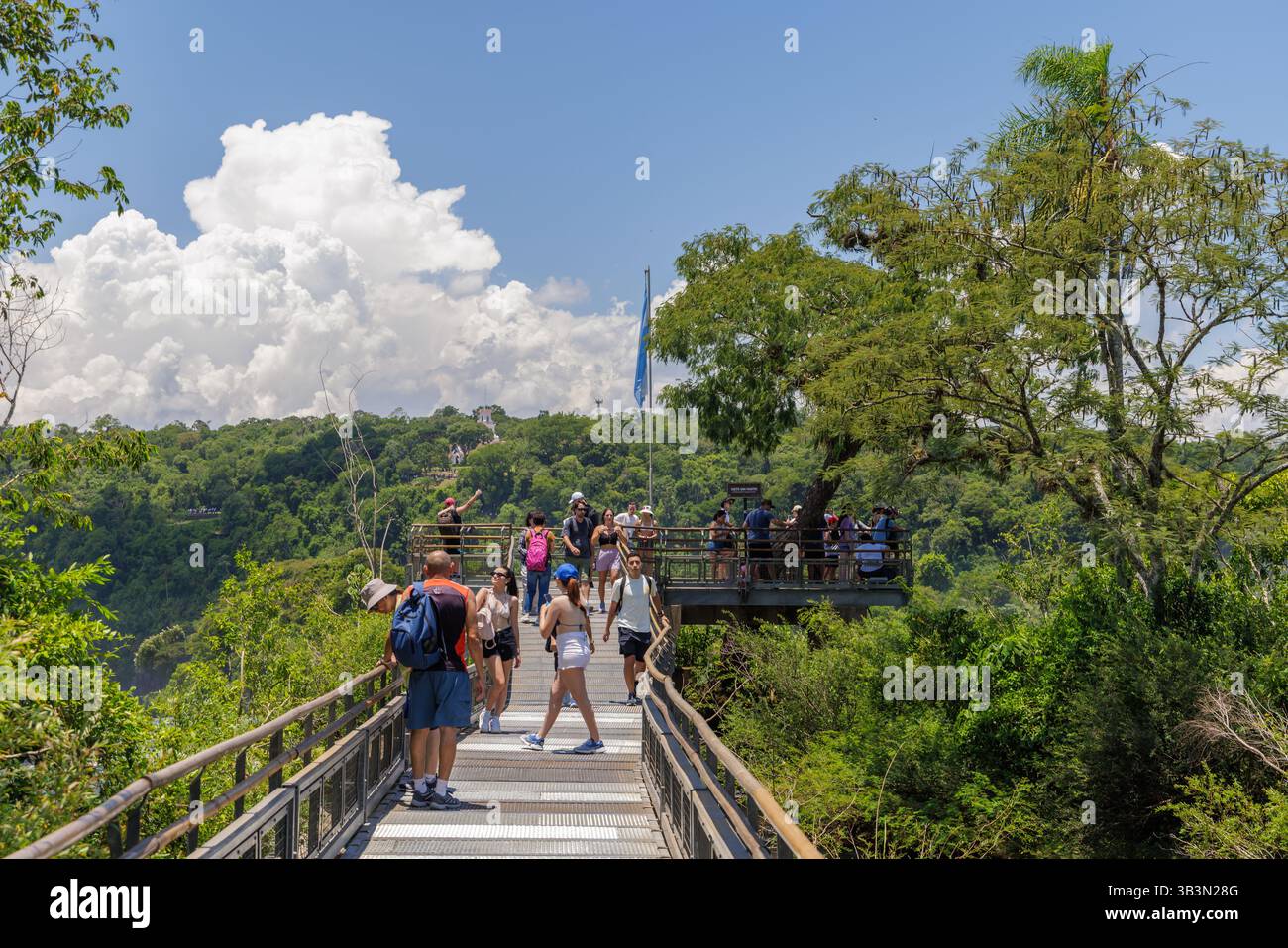 Puerto Iguazu, Misiones, Argentina - April 5th, 2025: Tourists in the Iguazu National Park in Argentina. Stock Photo