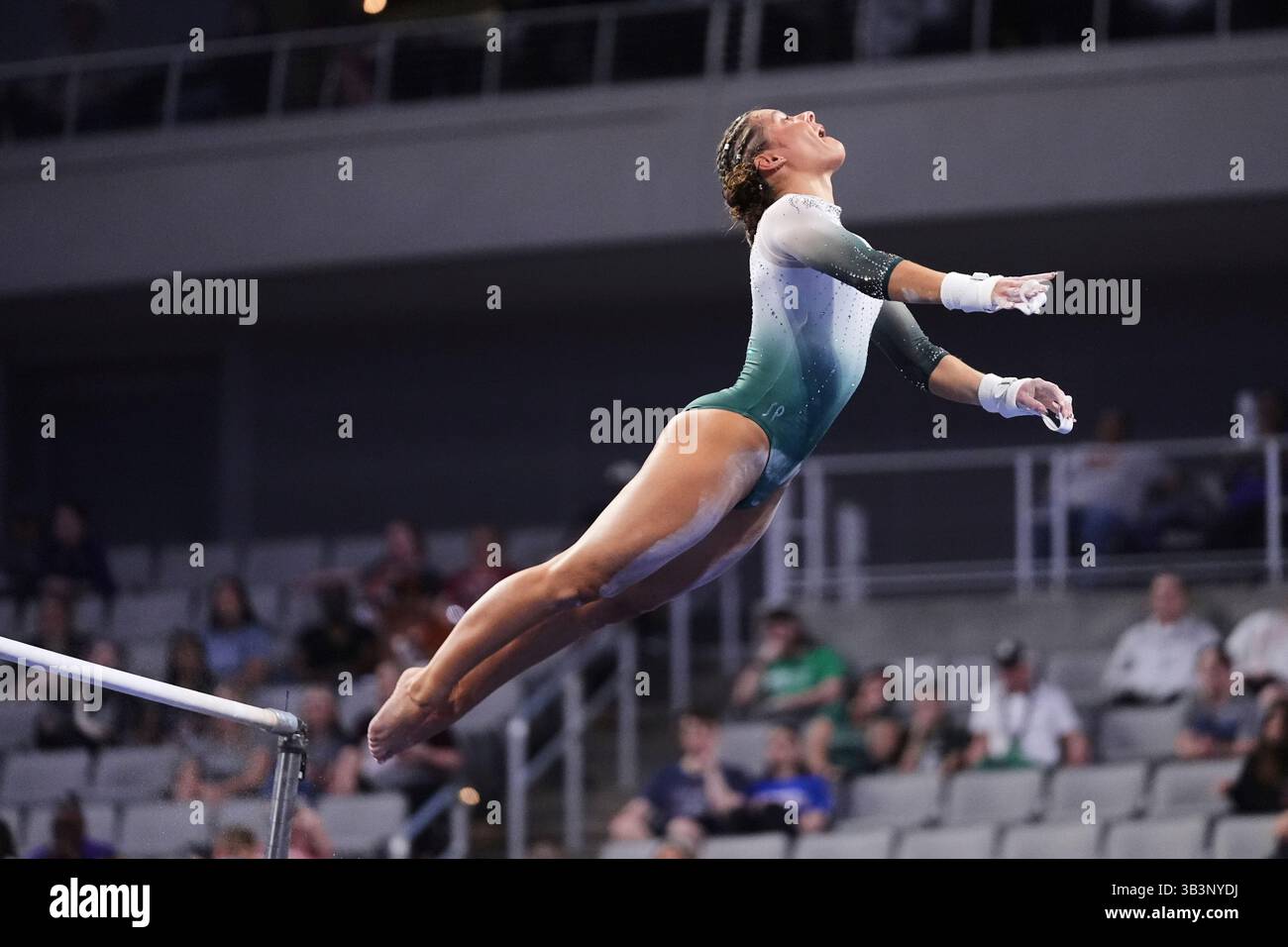 Michigan State's Sage Kellerman competes on the uneven bars during the ...