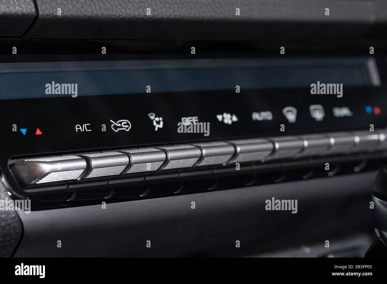 Panel with buttons to control ac in car macro close up view Stock Photo