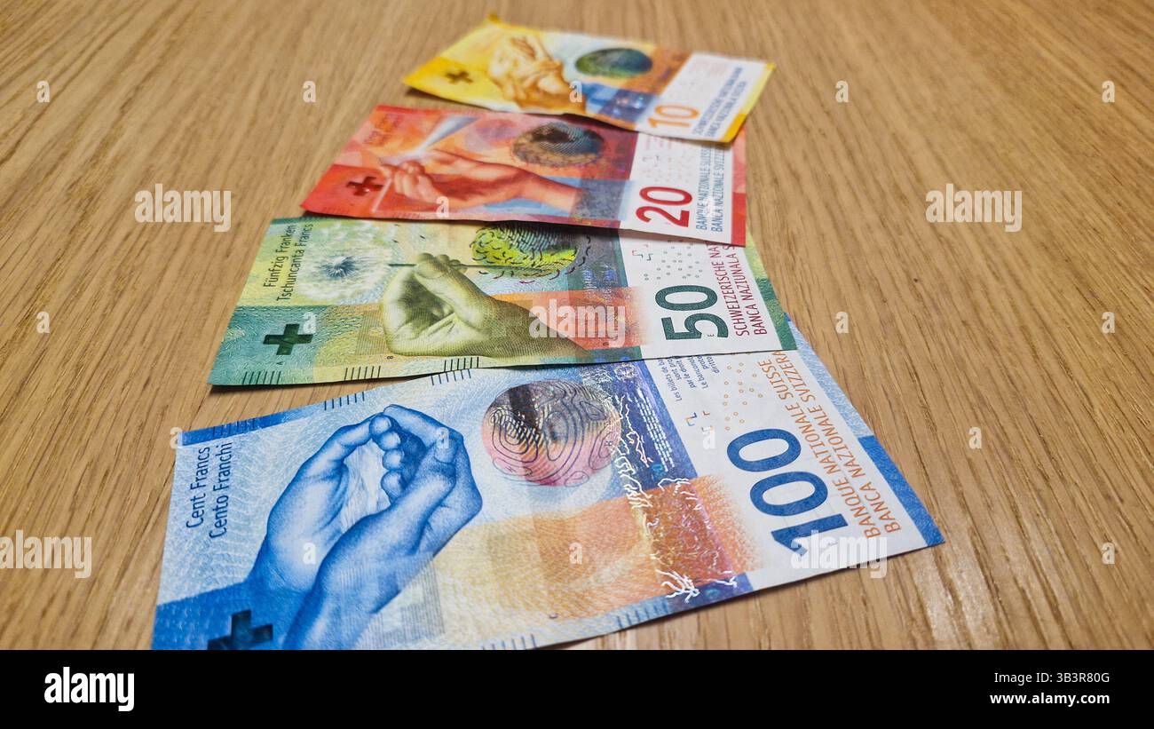Cash currency of Switzerland. Swiss francs CHF paper money. Concept of Swiss banking or payment system, economy and finance. - Smartphone Captured Stock Image