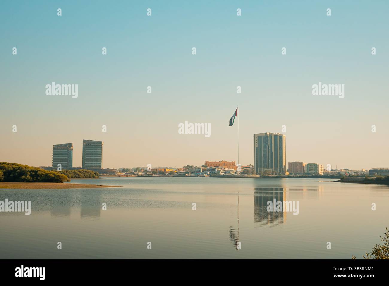 Ras al Khaimah city view, Palm-lined walkway. High quality photo Stock ...
