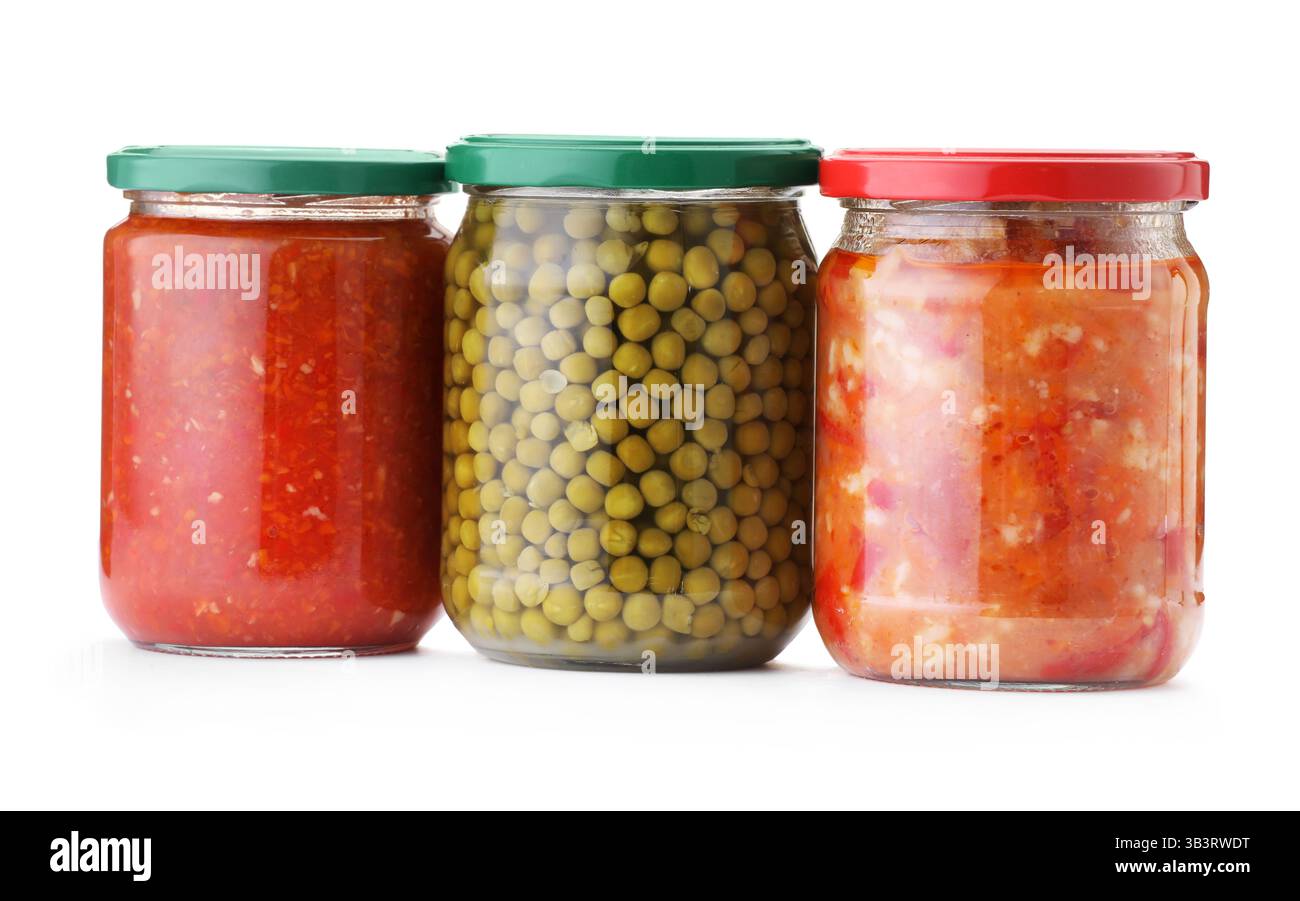 Many jars with different pickled products isolated on white Stock Photo