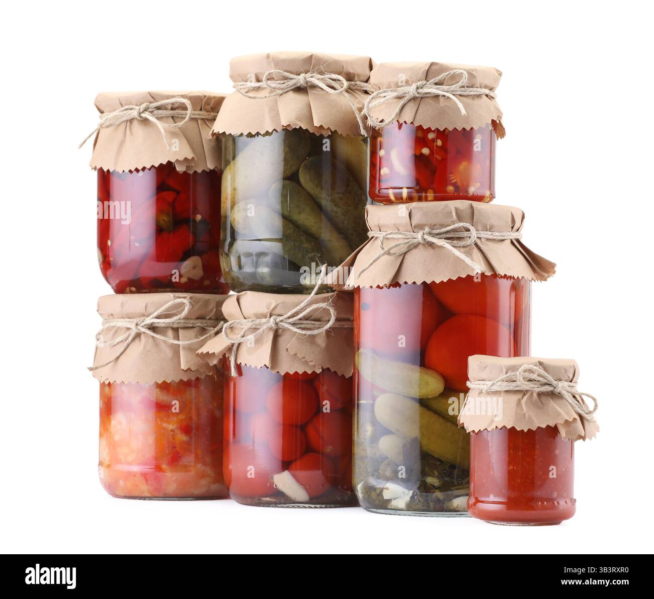 Many jars with different pickled products isolated on white Stock Photo