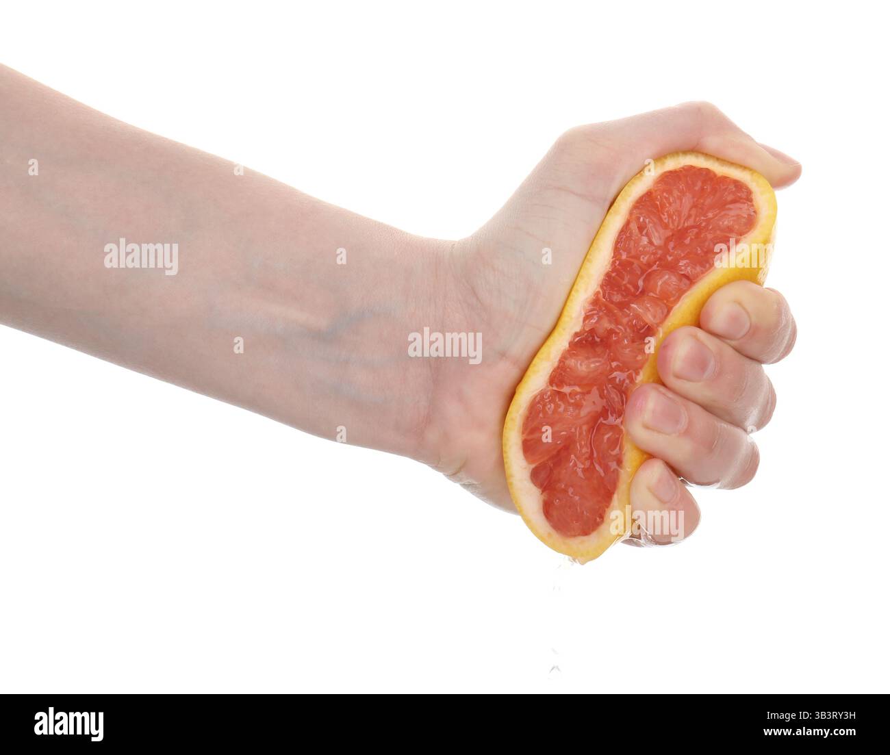 Woman squeezing grapefruit on white background, closeup Stock Photo