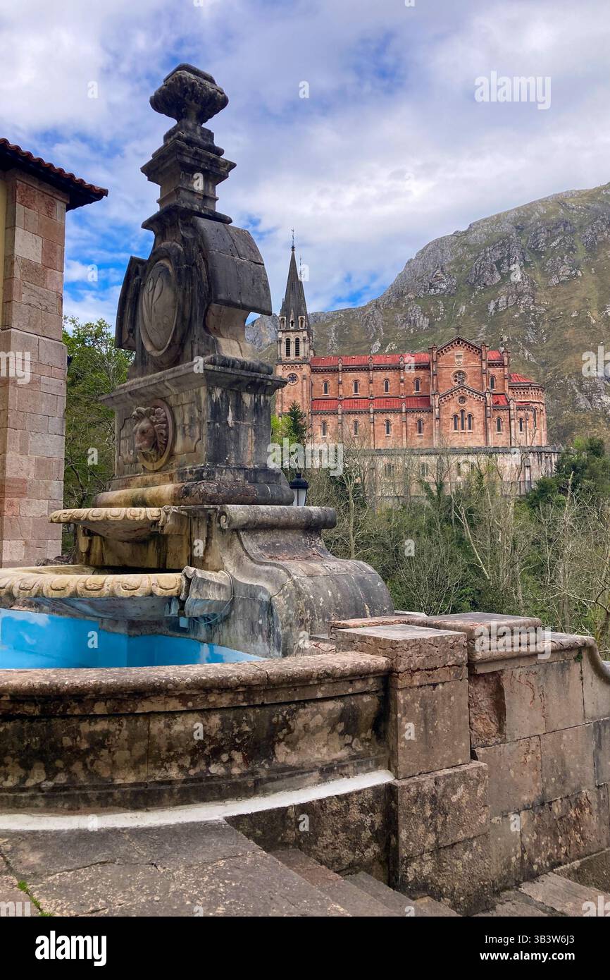 COVADONGA, SPAIN - APRIL  6, 2025: Covadonga in Asturias is a historic mountain village known for its sacred cave, basilica - Smartphone Captured Stock Image