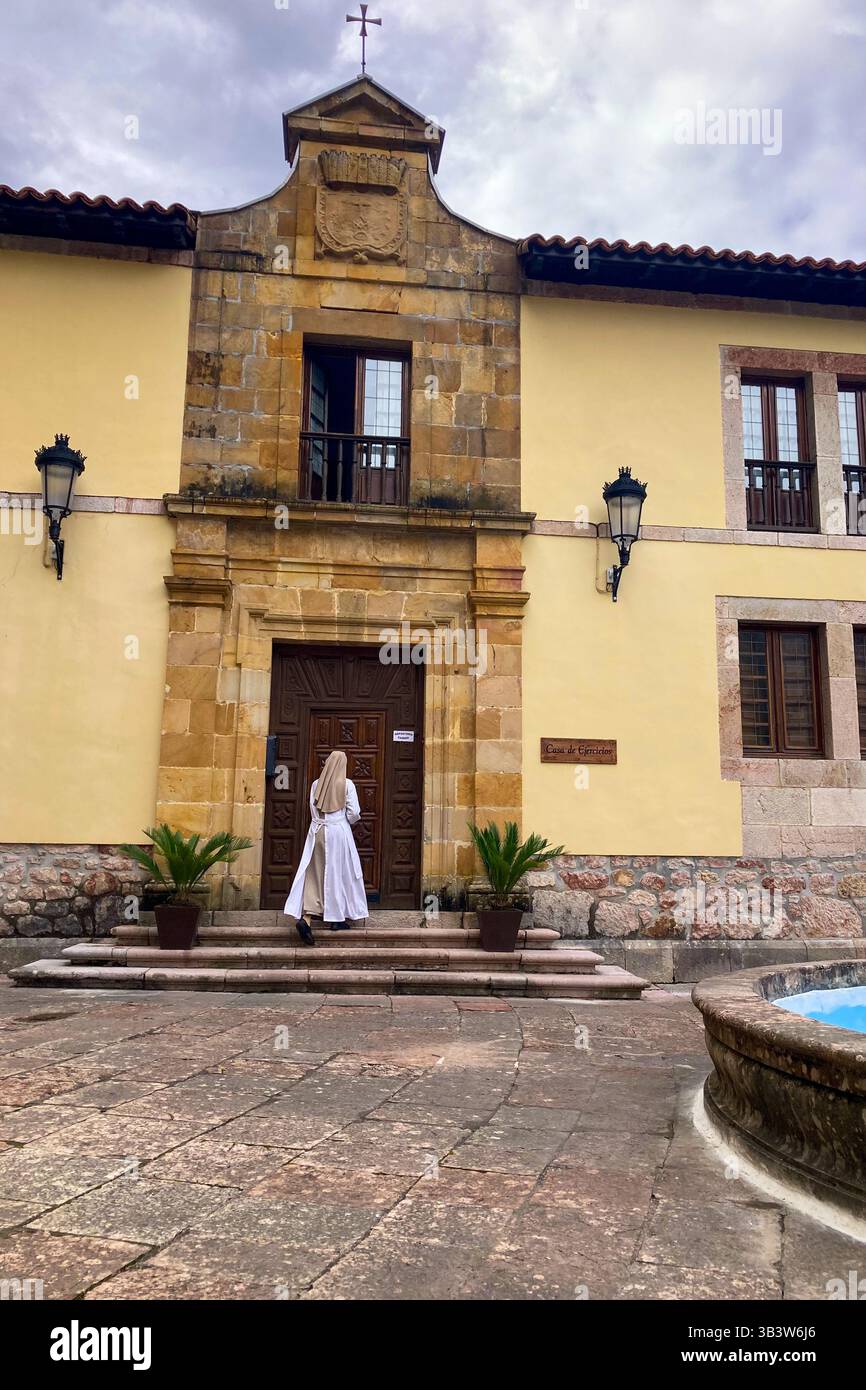 COVADONGA, SPAIN - APRIL  6, 2025: Covadonga in Asturias is a historic mountain village known for its sacred cave, basilica - Smartphone Captured Stock Image