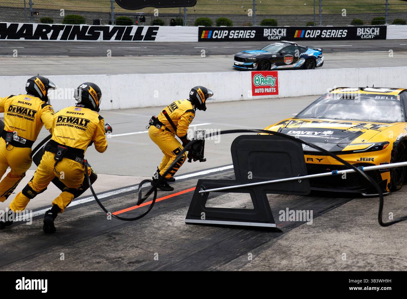 MARTINSVILLE, VA - MARCH 30: The pit crew of Christopher Bell (#20 Joe ...